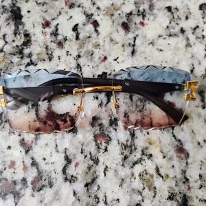 Gold and Brown Rimless Sunglasses
